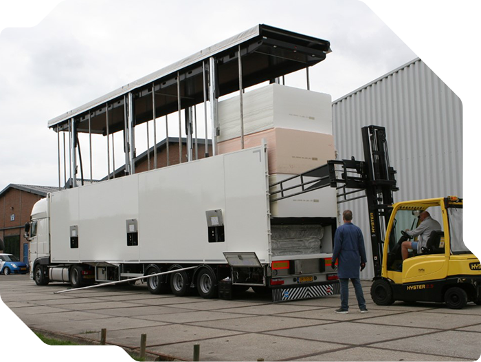 A press lorry of de Zwart being loaded