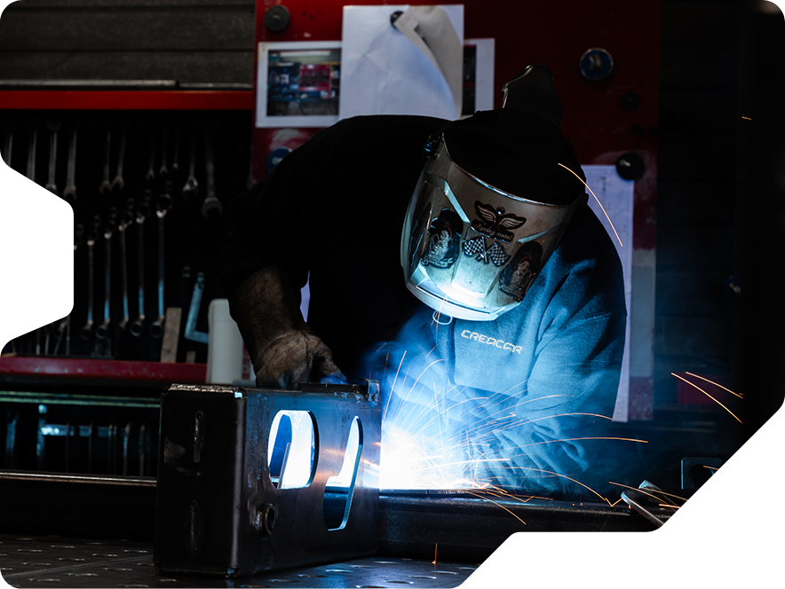 Our expert welder working on an innovative construction in our manufacturing facility