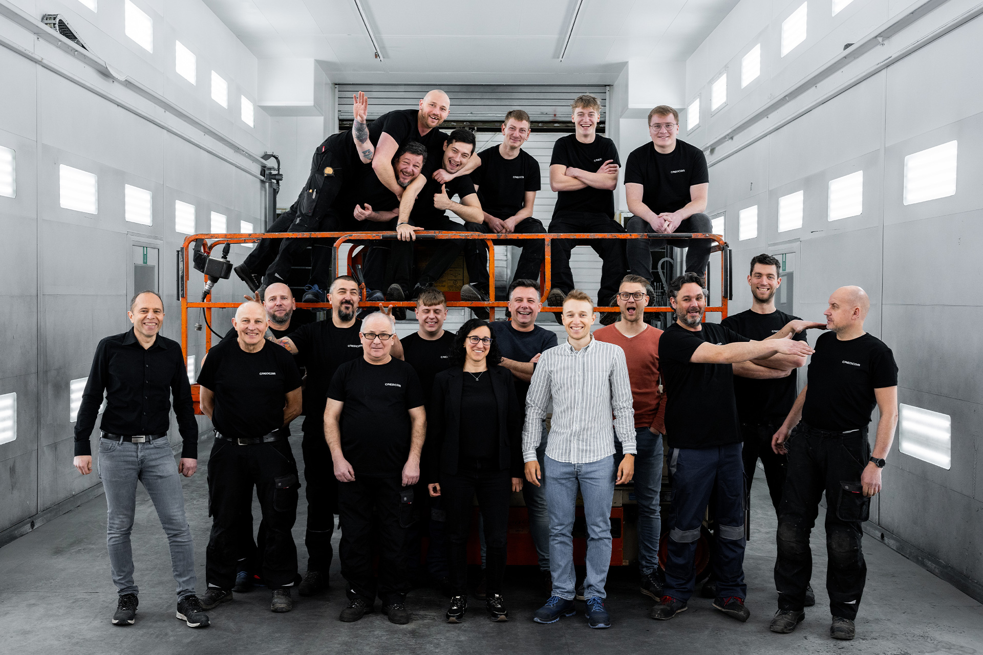 The complete Creacar team at their manufacturing and construction facility
