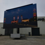 a rotatable mobile LED screen semi open trailer screen test at our manufacturing facility - city scene on screen